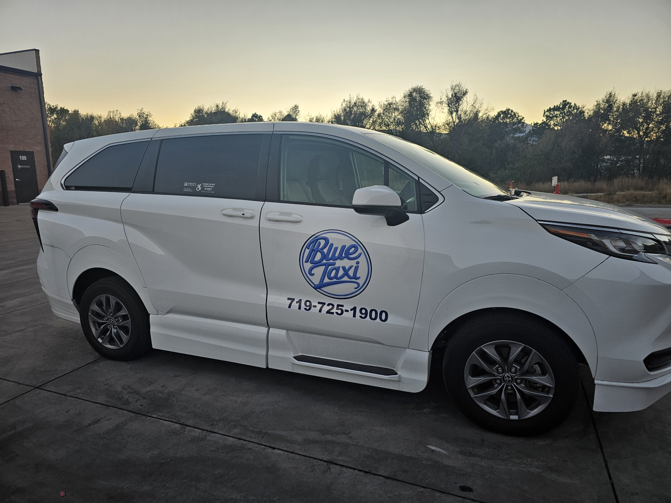 Blue Taxi Toyota Sienna