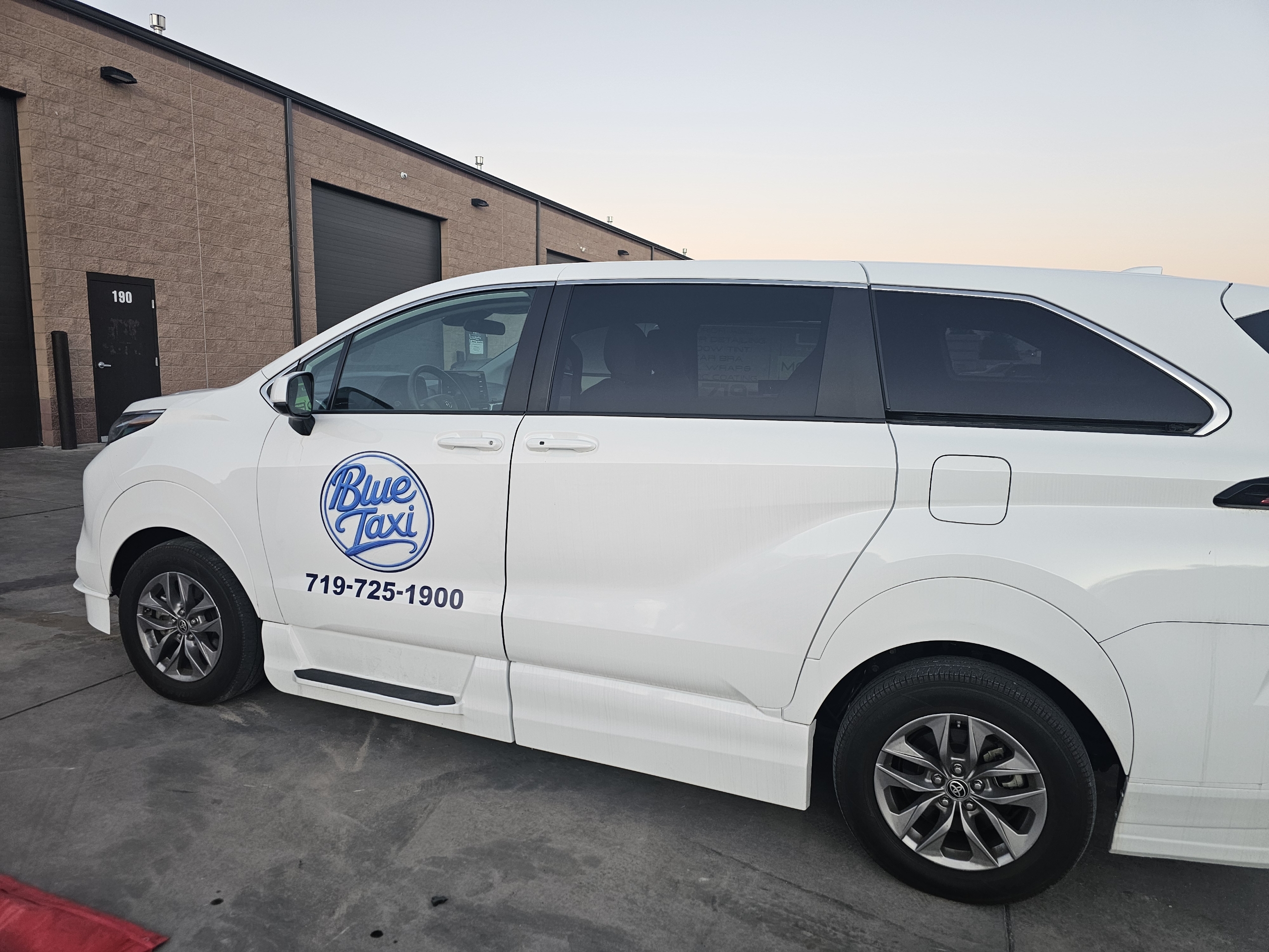 Blue Taxi Toyota Sienna