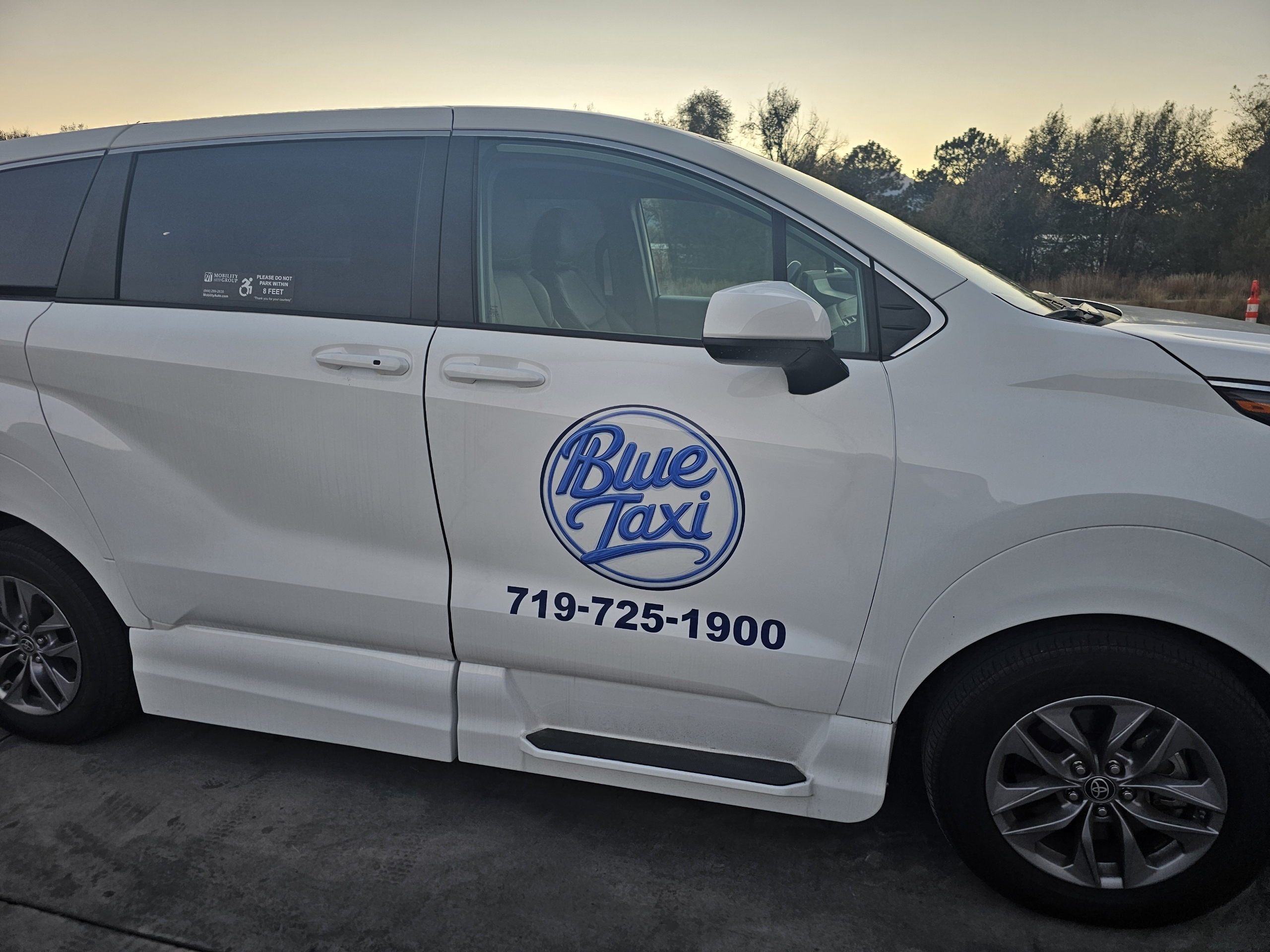 Blue Taxi Toyota Sienna