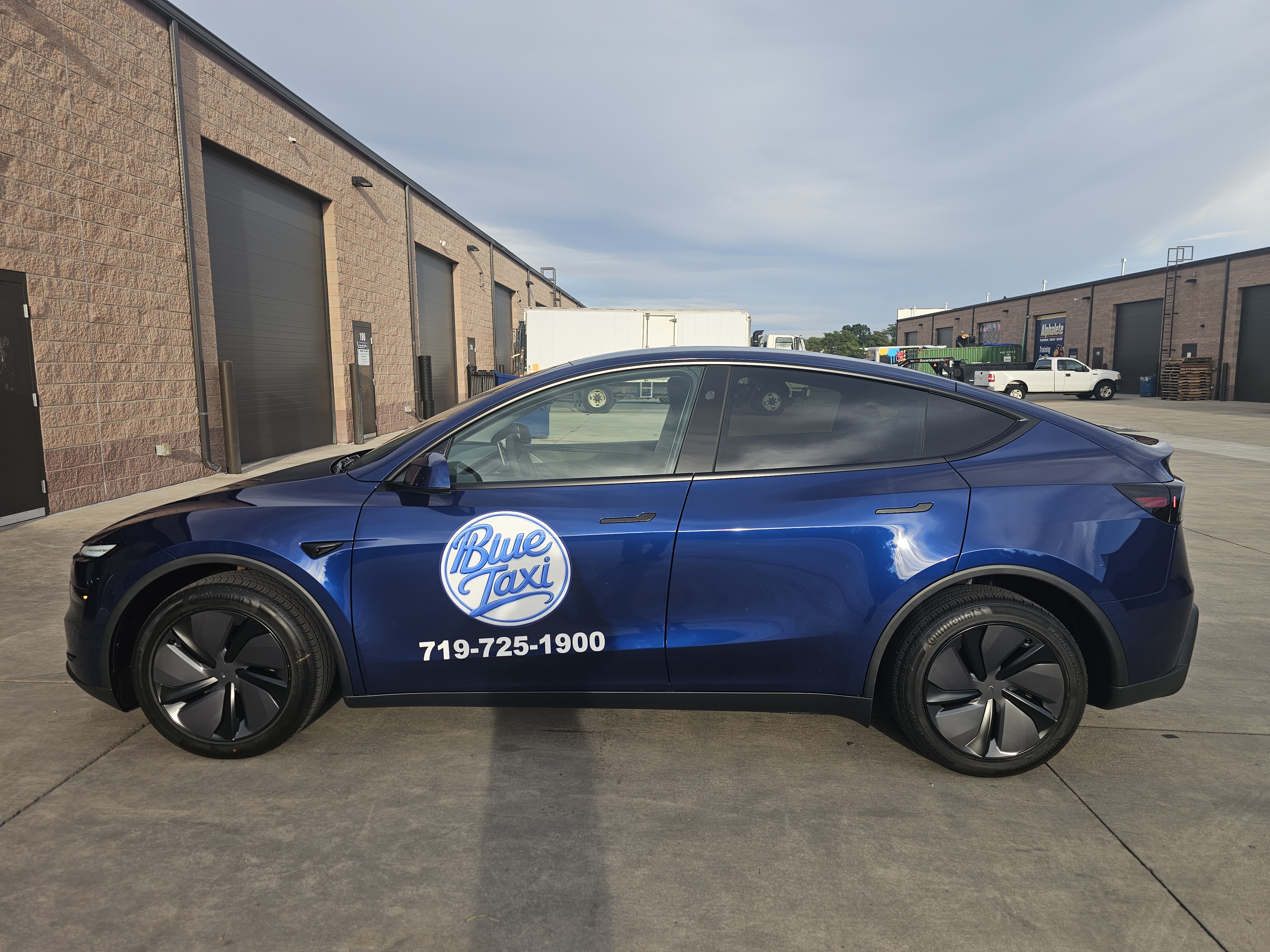 Blue Taxi Tesla Model Y